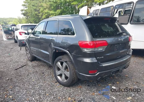 2015 Jeep Grand Cherokee Overland из США, поврежденный, VIN 1C4RJFCG7FC667221